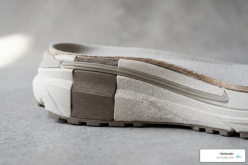 Stability shoe midsole construction showing medial posting and guide rail support