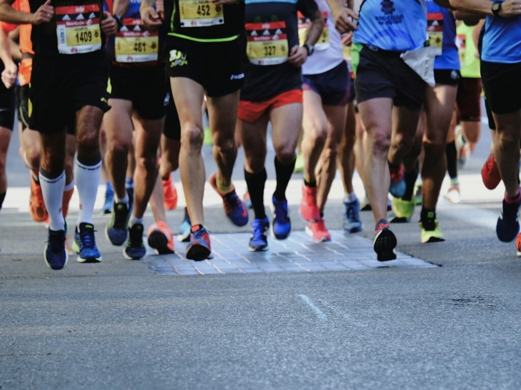 elite marathon runners wearing racing shoes
