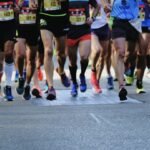 elite marathon runners wearing racing shoes