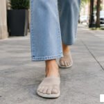 women wearing wide toe box shoes while walking