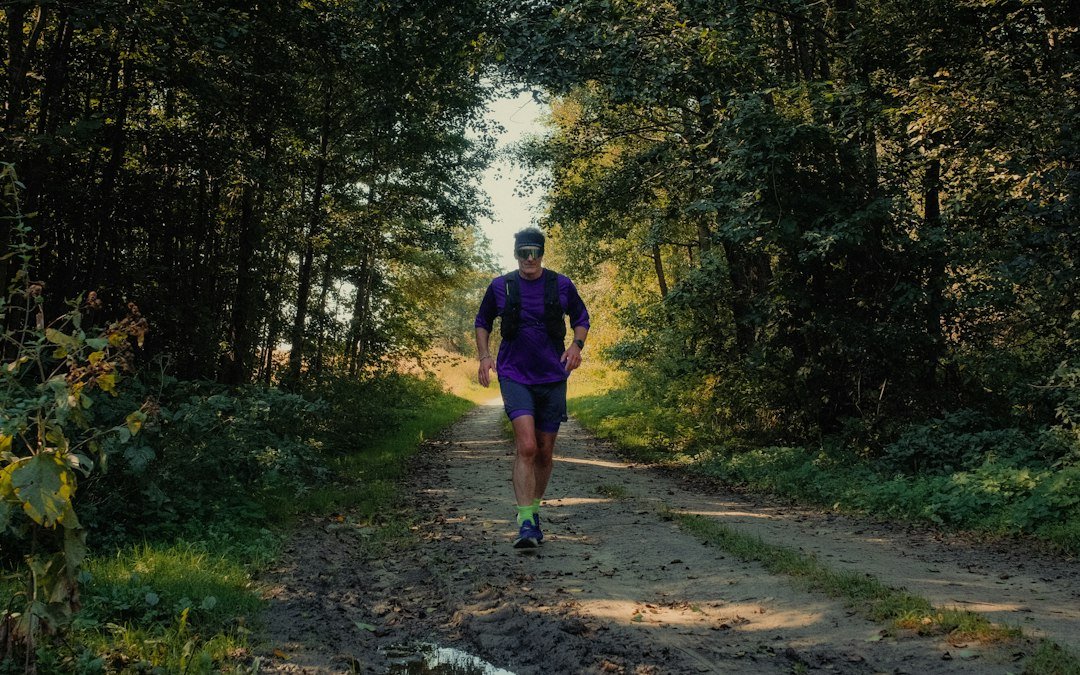 trail runner navigating rough terrain in supportive footwear