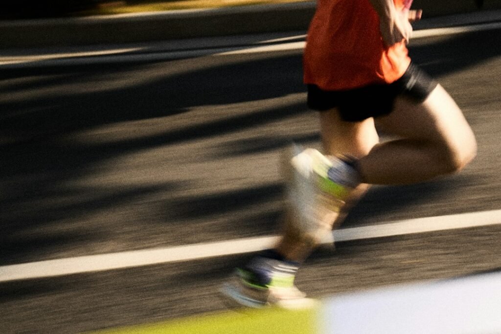runner in running shoes on a road