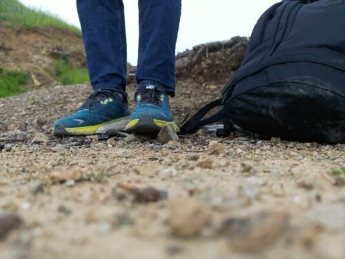 podiatrist examining a HOKA running shoe