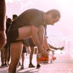 runner trying on roomy toe box running shoes