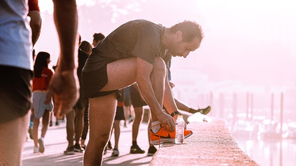 runner trying on roomy toe box running shoes